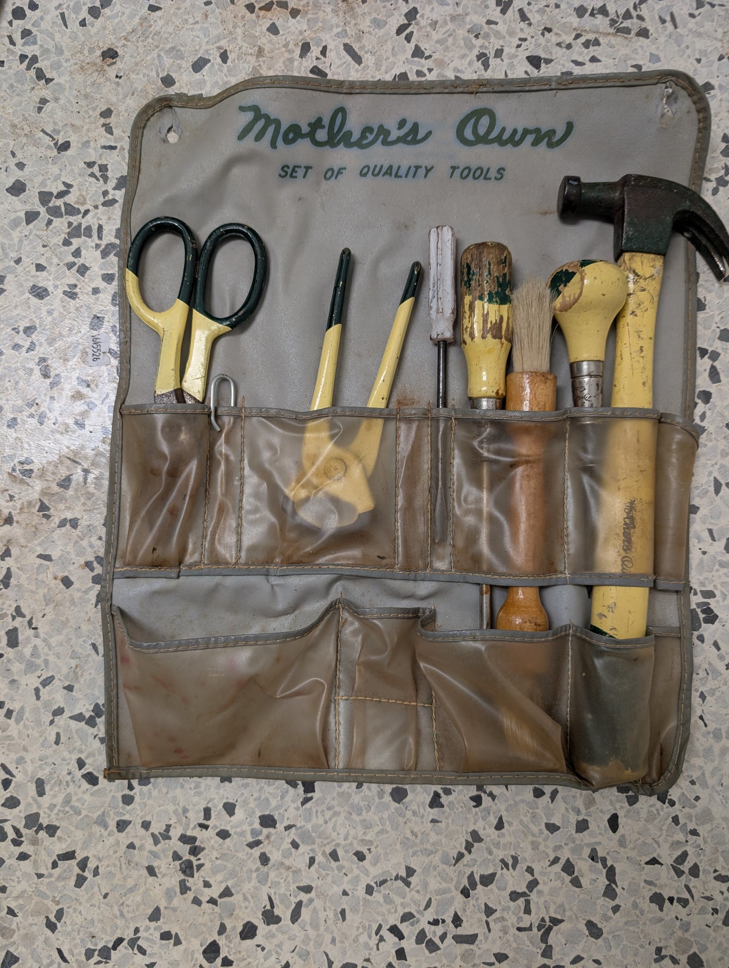 Pexto Mother's Own tool set in original display pouch. Screwdrivers, hammer, clippers, heavy duty scissors, awl, pliers, tape measure, and more! Handy vinyl compartmented case to keep everything organized. 15" X 13" X 1 1/2"