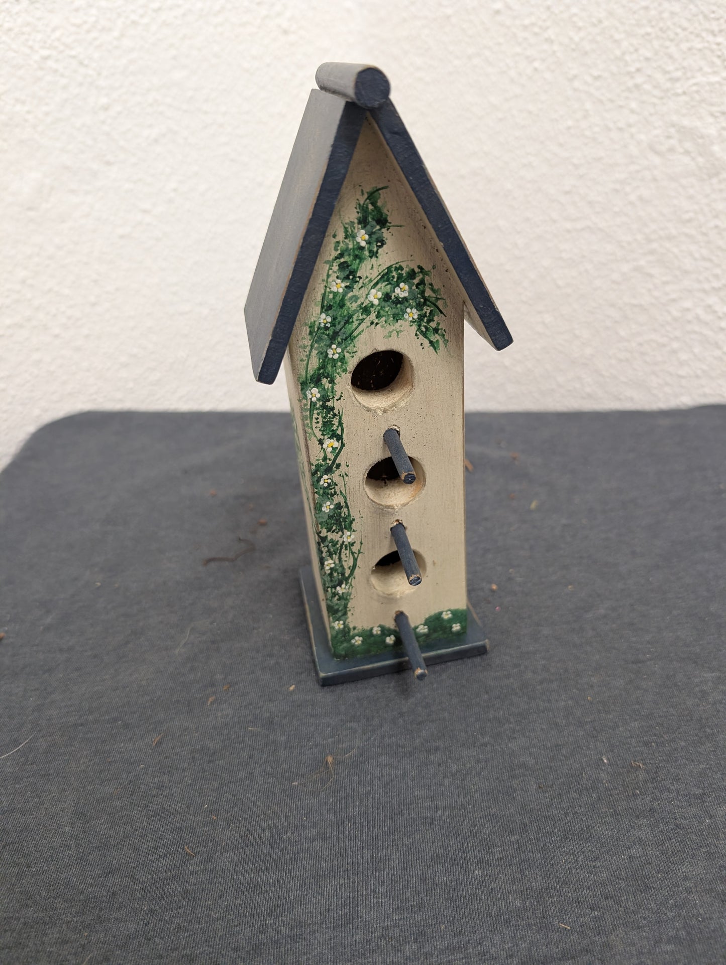 Vintage handcrafted three post tall birdhouse