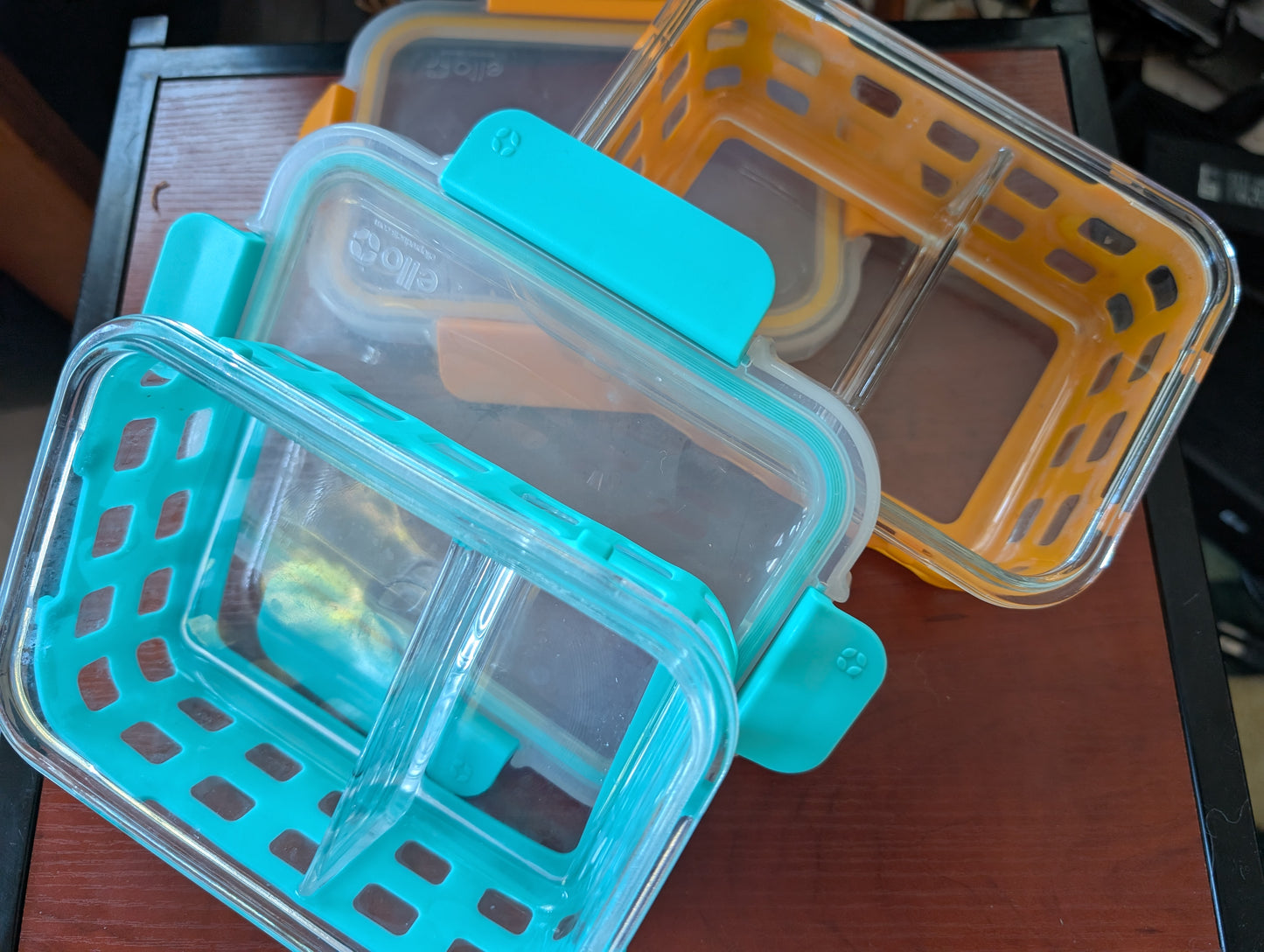 Two double partition glass storage containers