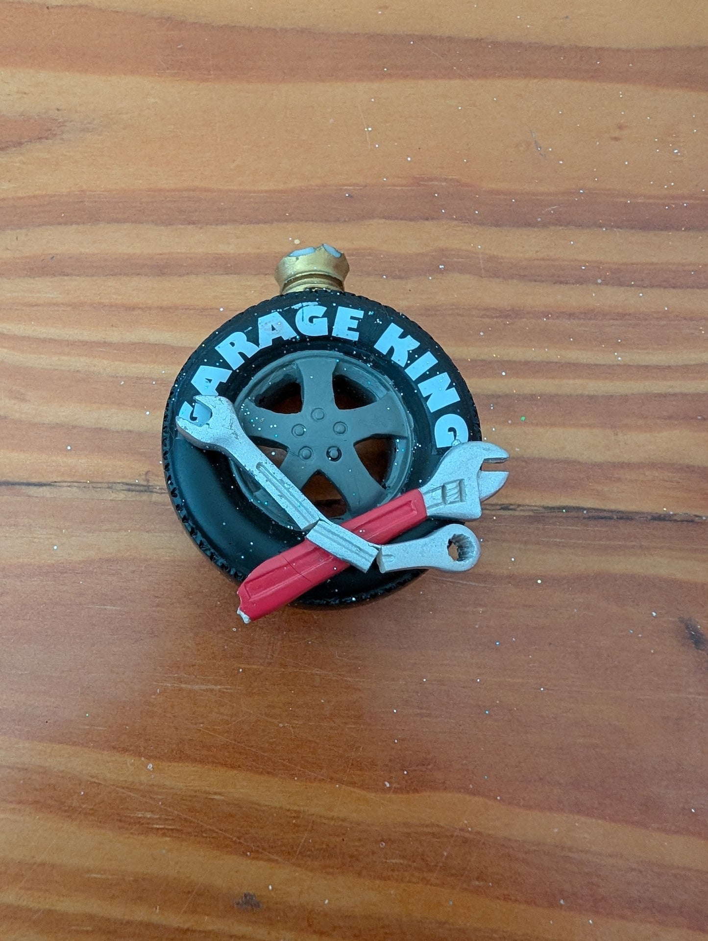 "Garage King" Tire Ornament from Unknown - Ornaments (Resin or Plastic Ornament, Hobby, Novelty, Black, Silver, Red, White)