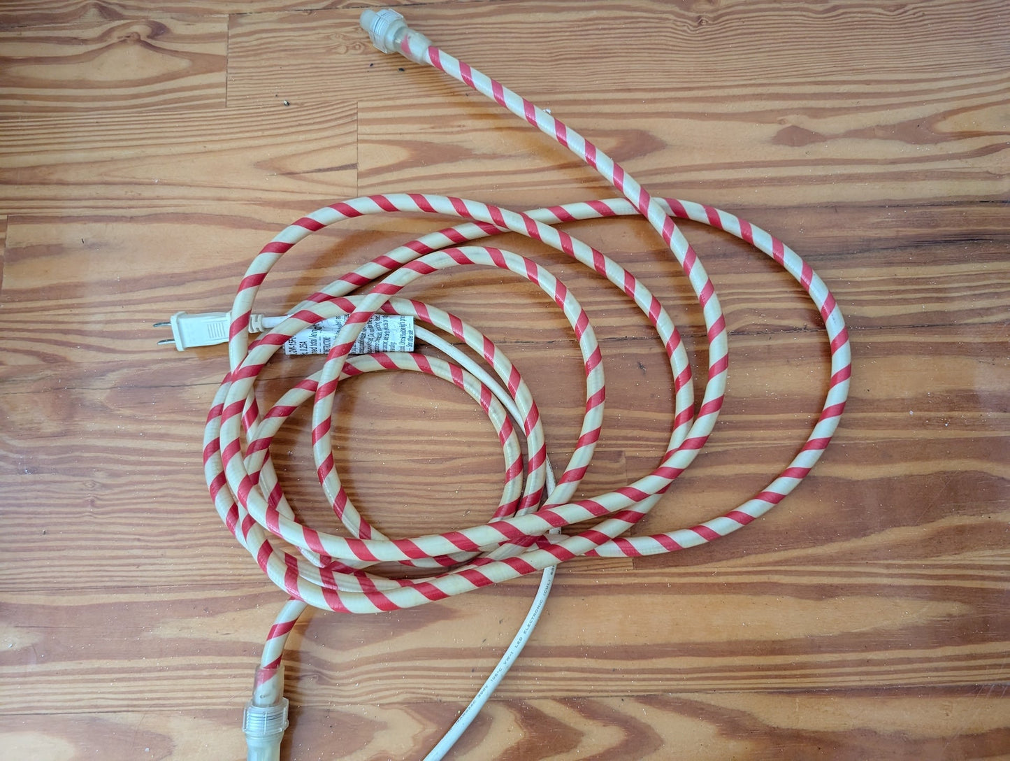 Candy Cane Extension Cord from Unknown - Holiday Decor (Plastic, Metal, Fabric Lighting / Utility, Traditional, Red, White)