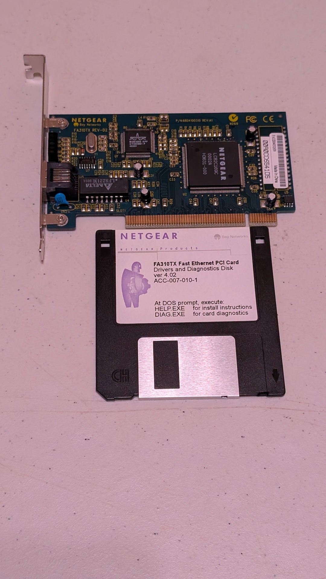 FA310TX Fast Ethernet PCI Card from Netgear - 1990s Computer Components (PCB, Metal, Plastic Network Adapter, Retro Tech, Green, Silver, Black)