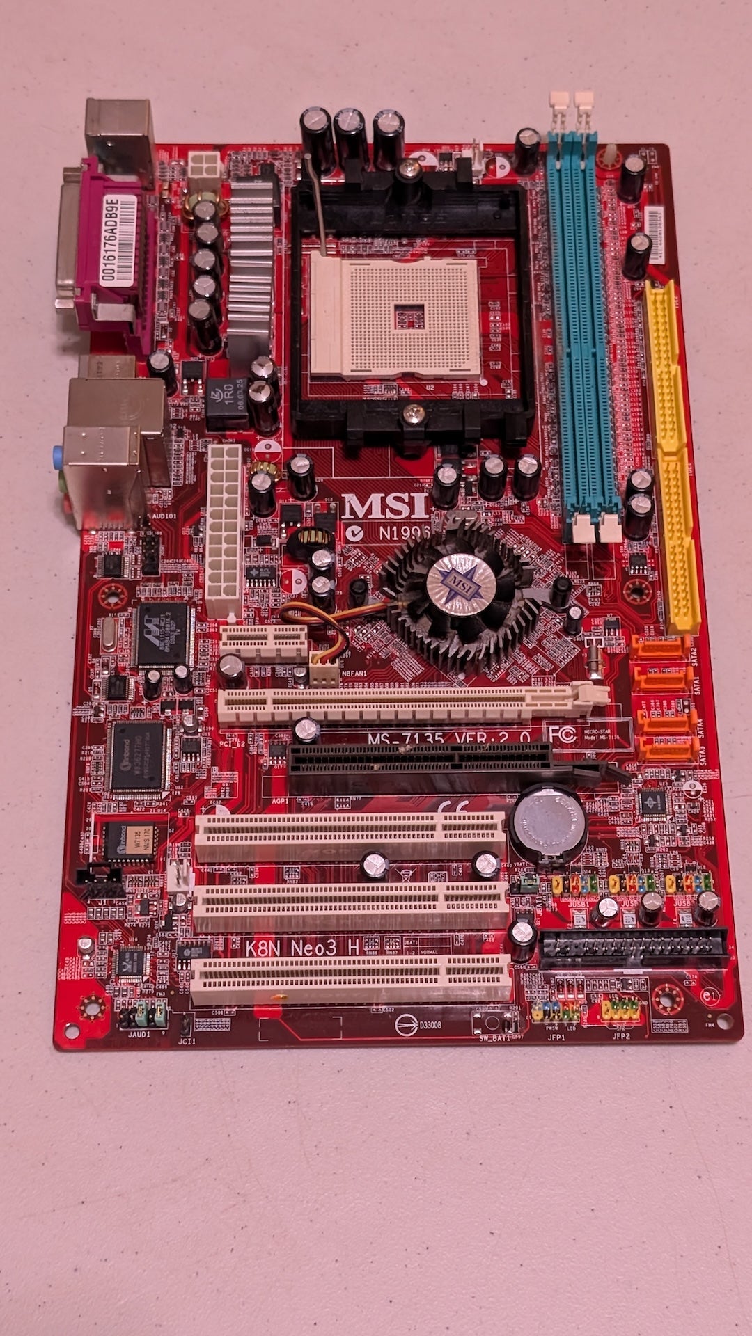 K8N Neo3 (MS-7135 VER: 2.0) from MSI - 2000s Computer Components (PCB, Metal, Plastic Motherboard, Retro Tech, Gamer Aesthetic, Red, Teal, Yellow)