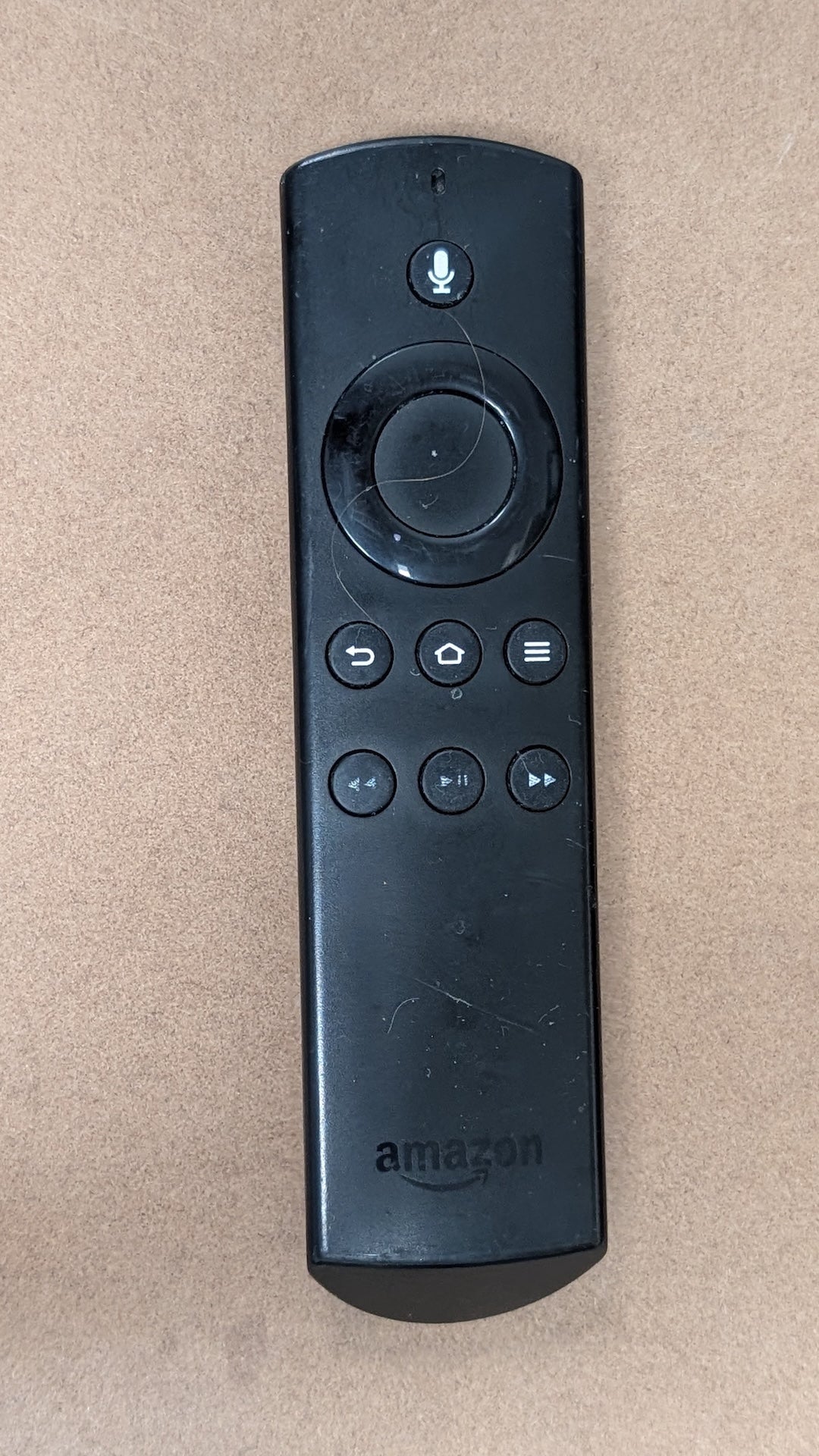 Remote from Amazon - 2010s Electronics > Accessories > Remote Controls (Plastic, Rubber Streaming Media Remote, Minimalist, Modern, Black)