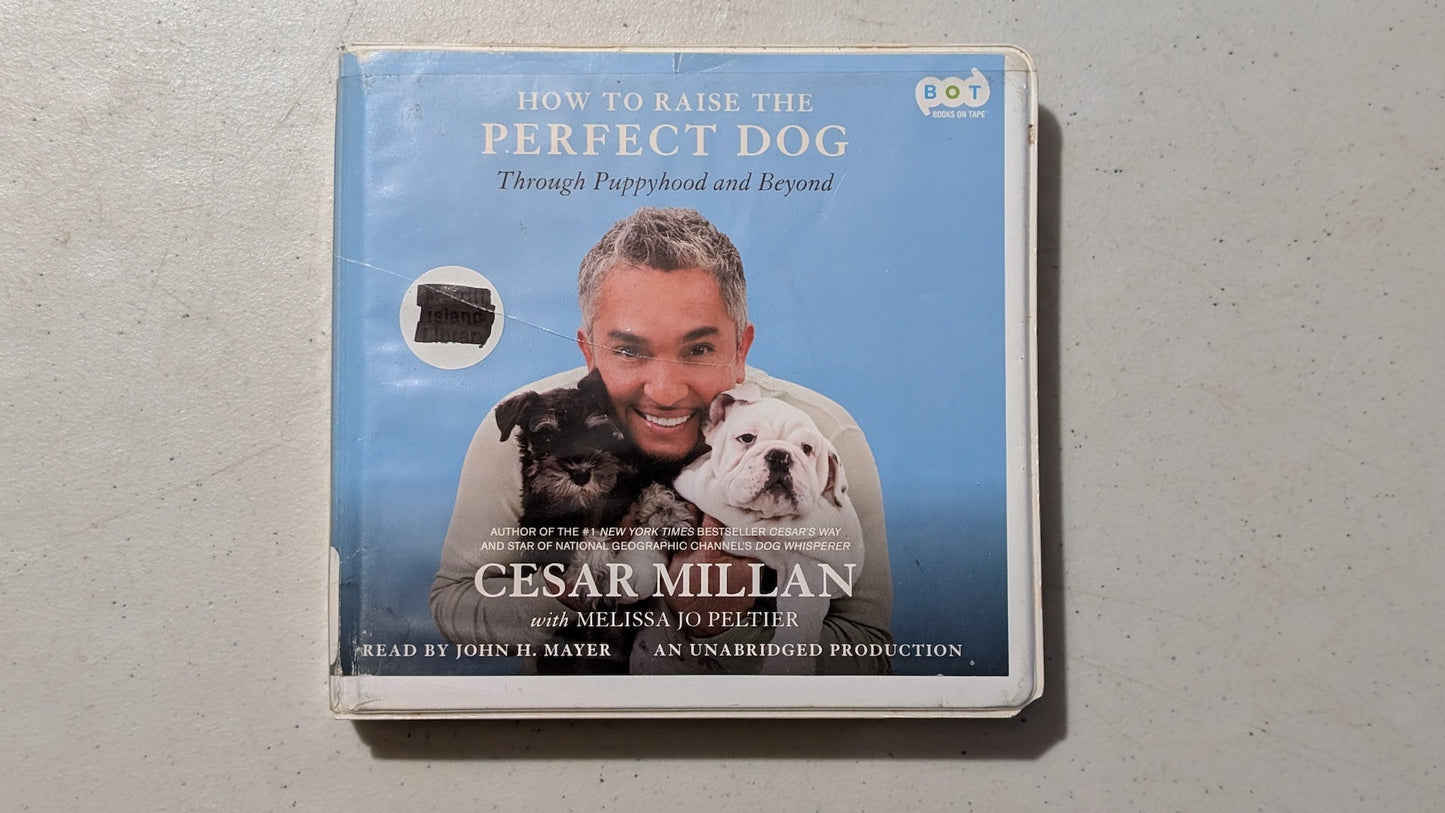 How to Raise the Perfect Dog: Through Puppyhood and Beyond by Cesar Millan with Melissa Jo Peltier (Non-fiction, Pets, Audiobook on CD, 2009, Former Library Book)