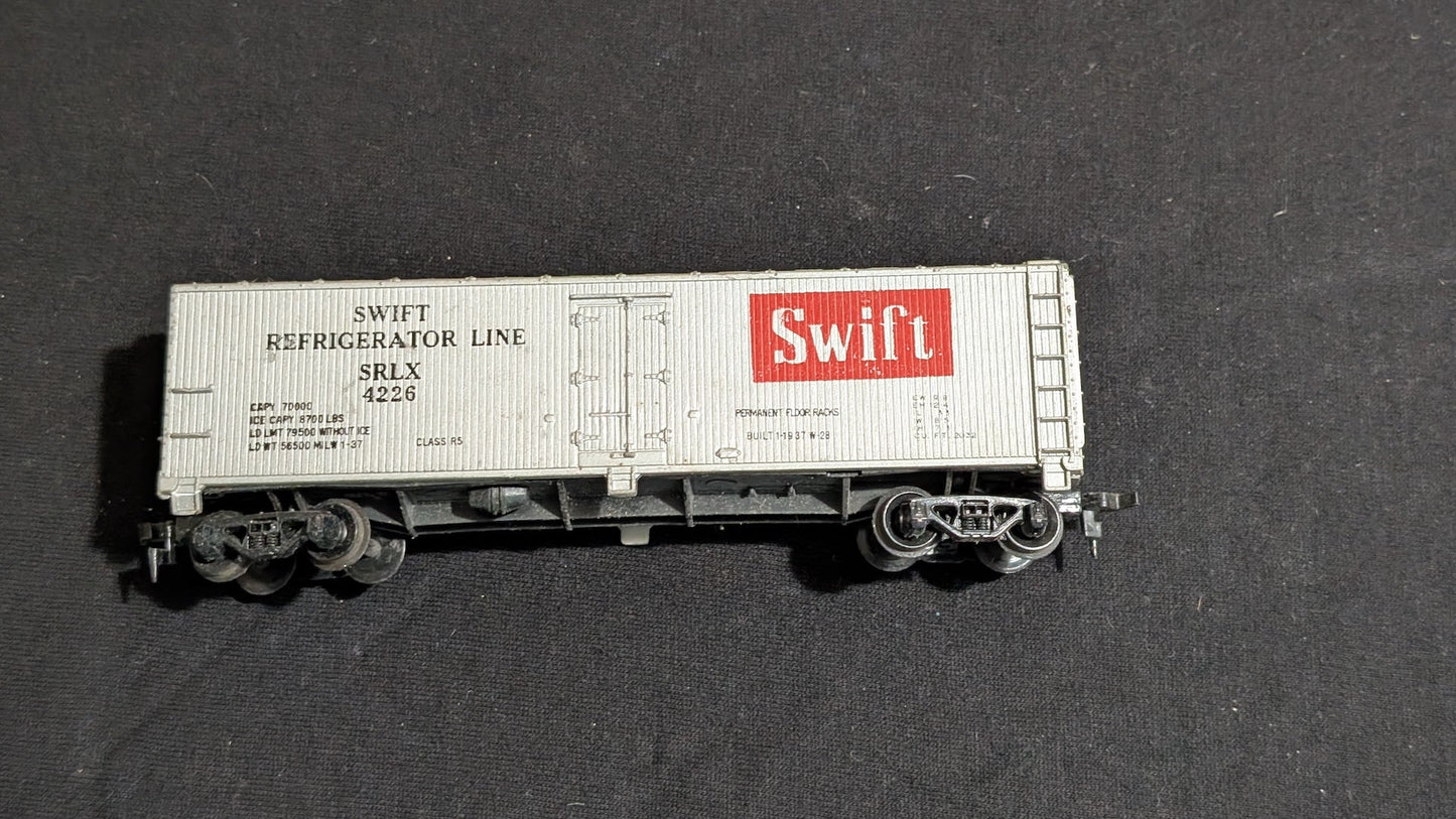 Swift Refrigerator Line Reefer Boxcar (Reefer) likely from Athearn - 1960s-1970s HO Scale Model Train (Plastic, Metal Boxcar (Reefer), Not Applicable, Silver, Red, Black)