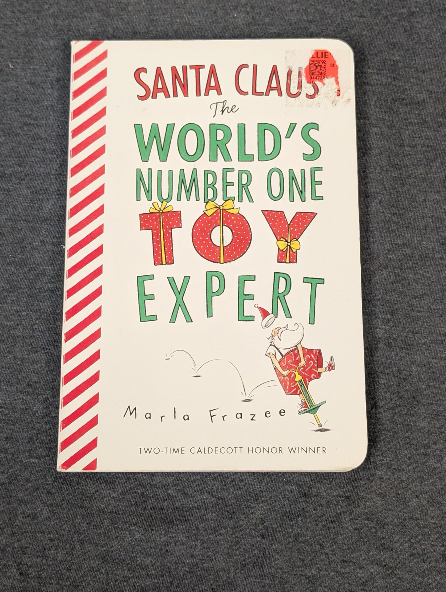 Cover of the children's board book Santa Claus The World's Number One Toy Expert by Marla Frazee.