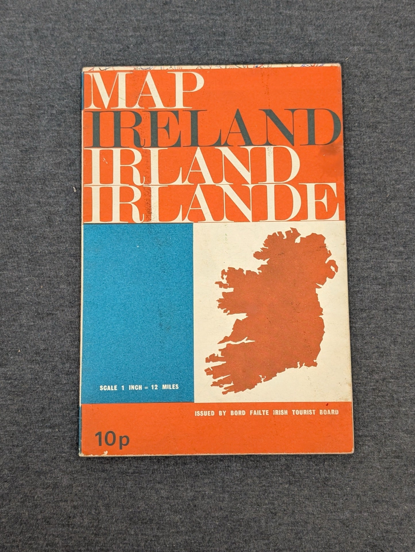Cover of a vintage Map Ireland issued by Bord Failte featuring a bold orange, blue, and white graphic design.