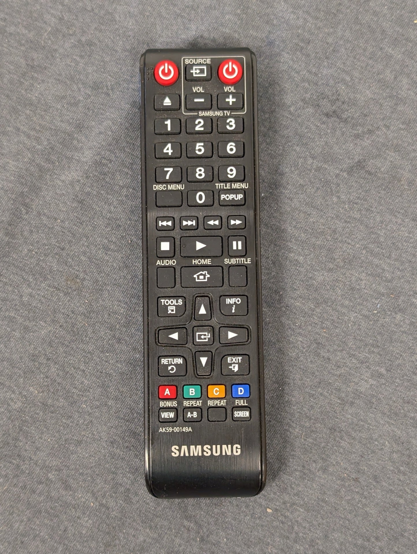Samsung AK59-00149A remote control on a grey surface