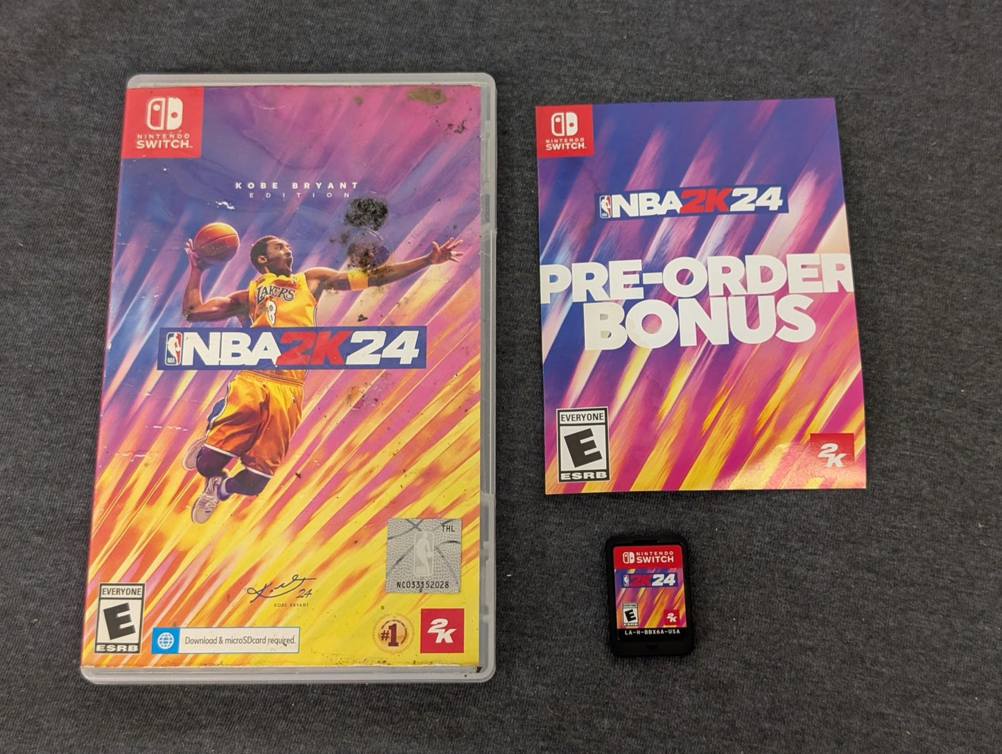 NBA 2K24 Kobe Bryant Edition Switch game case with damage and cartridge