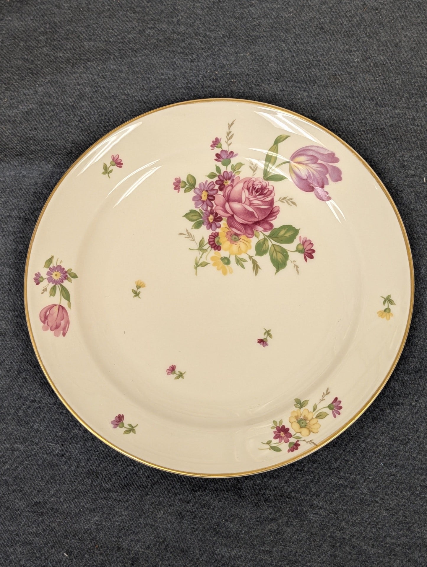 Antique Rosenthal plate featuring pink roses and gold trim