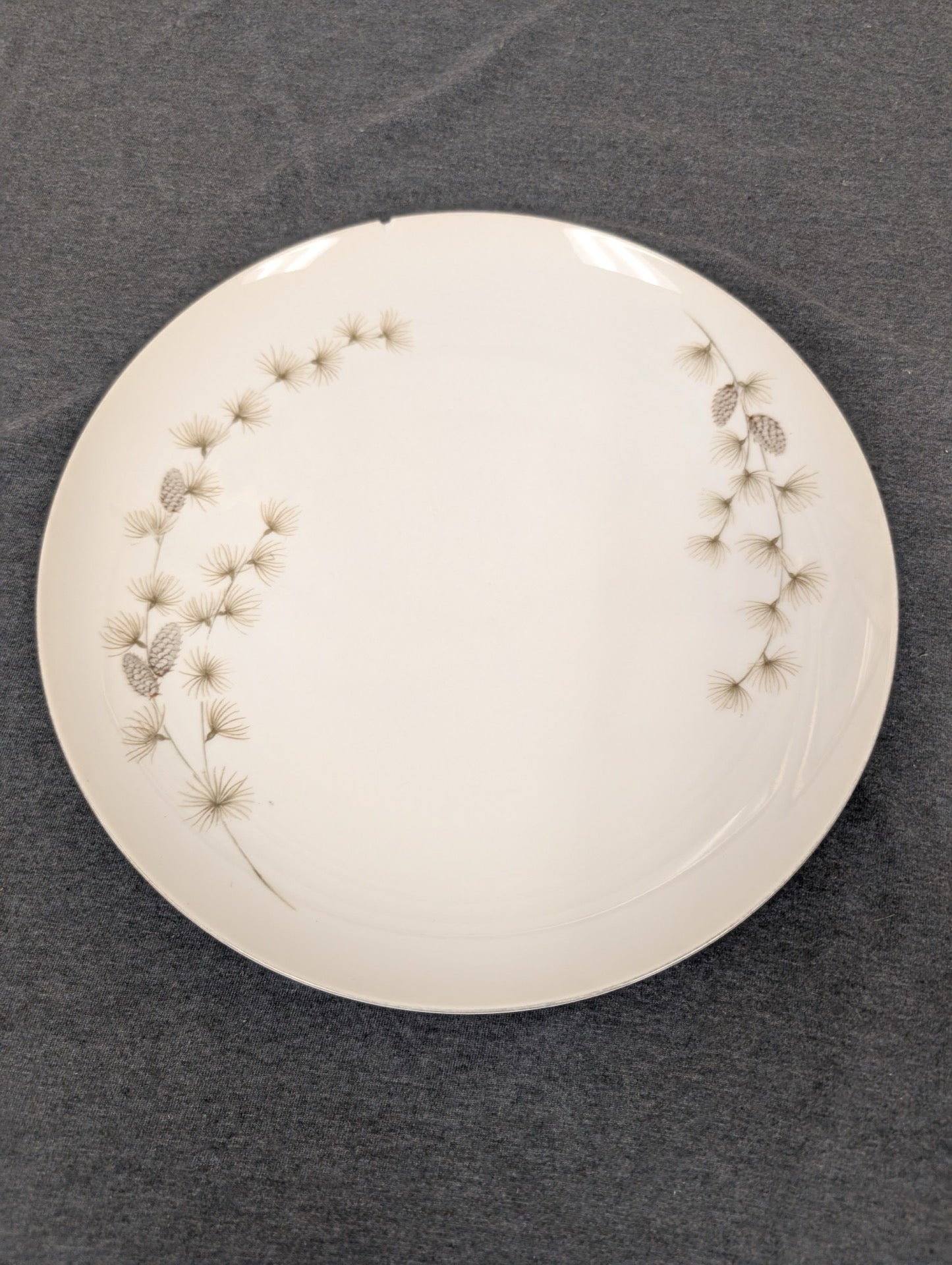 Mikasa Sequoia 6141 plate with pinecone pattern showing minimal edge chipping