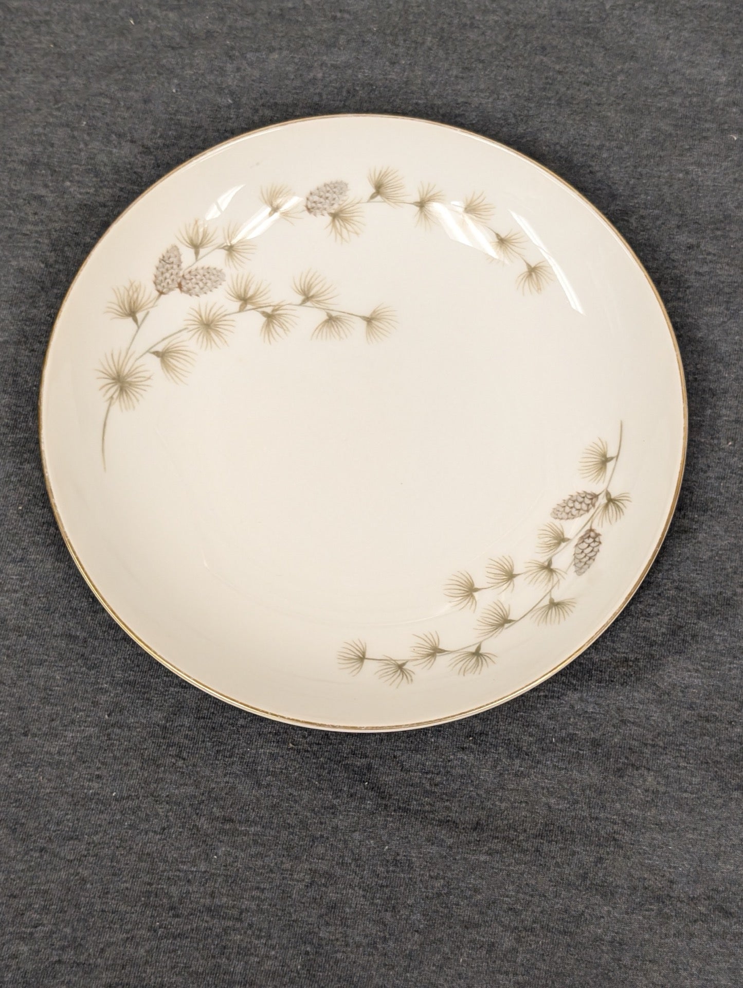 Vintage Mikasa plate Sequoia 6141 pattern with pinecones on white background