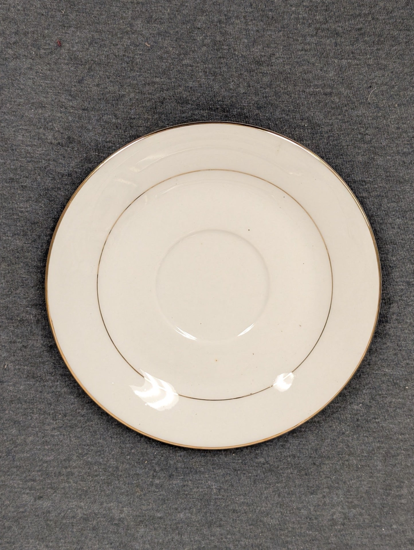 Top view of Sakura Classic Gold saucer showing inner gold ring