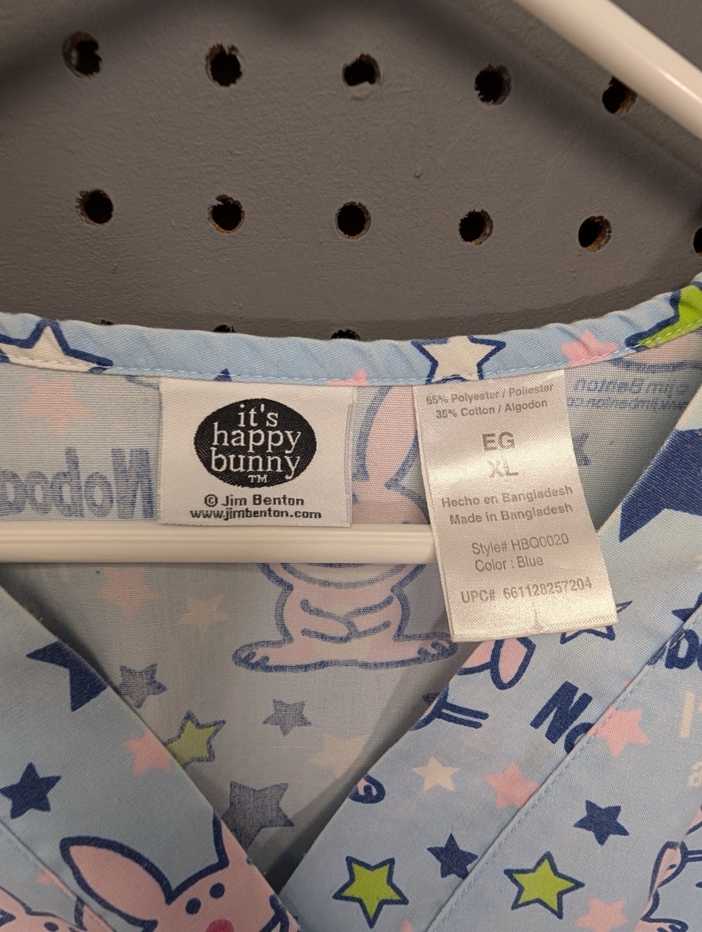 Tag showing It's Happy Bunny and size XL