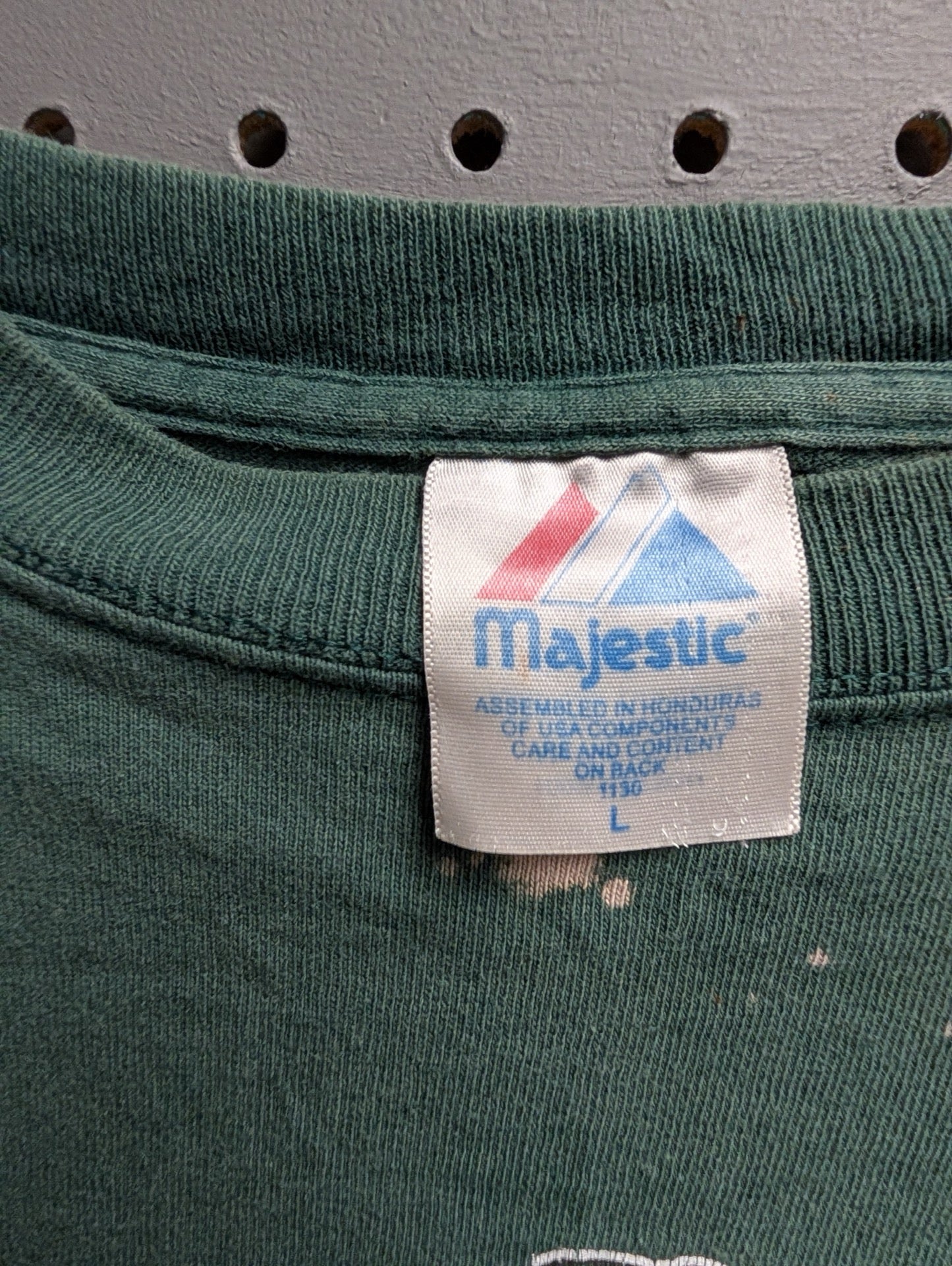 Majestic brand tag inside collar showing size Large