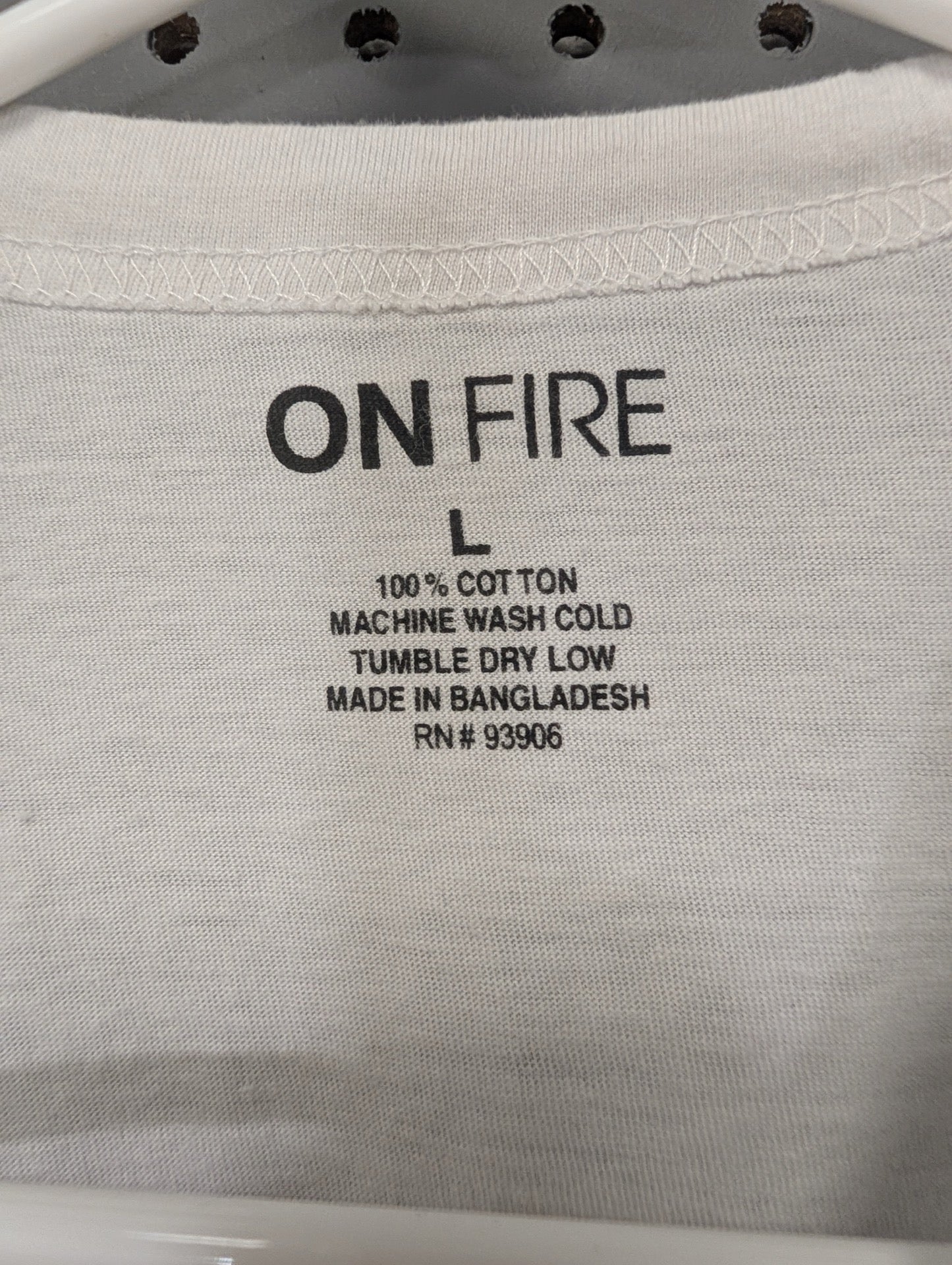On Fire size Large clothing tag
