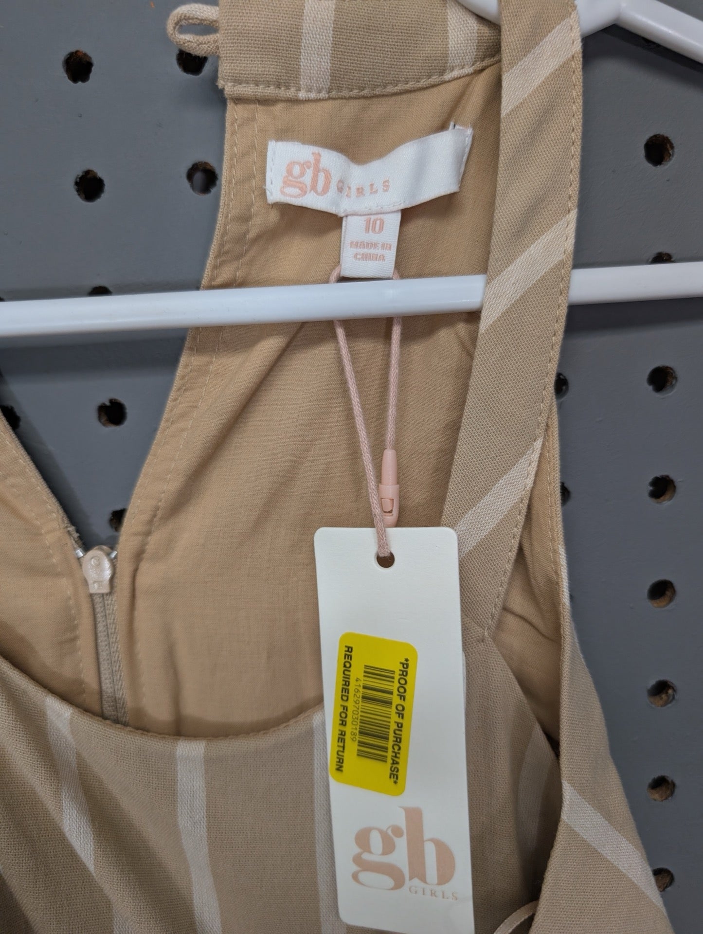 Tag view of GB Girls striped jumpsuit