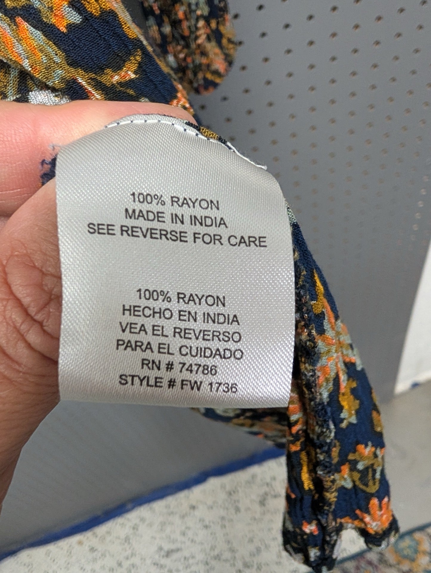 Tag showing 100% Rayon and RN number