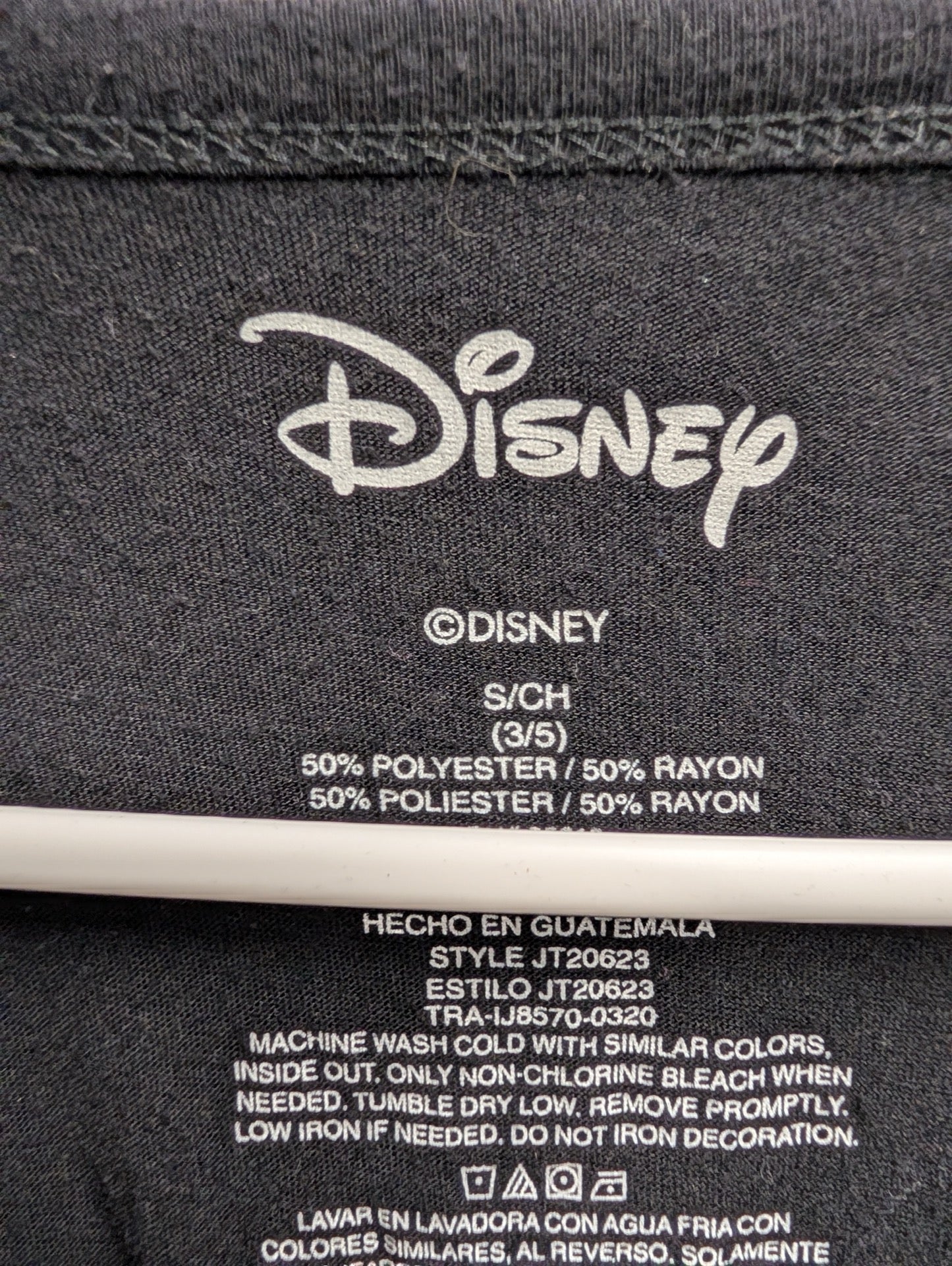 Close up of Disney tag size Small