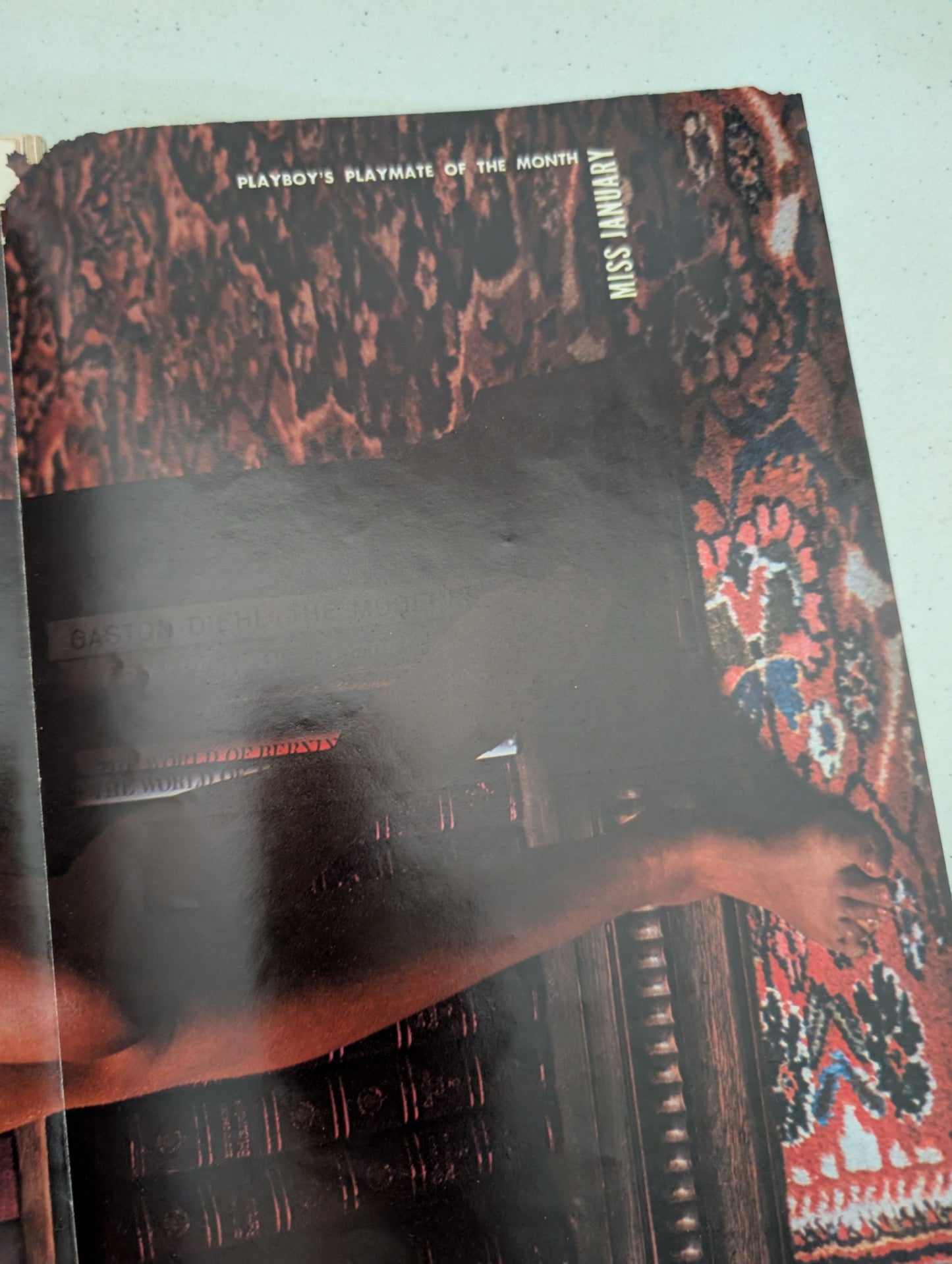 Inside centerfold page view of vintage Playboy magazine