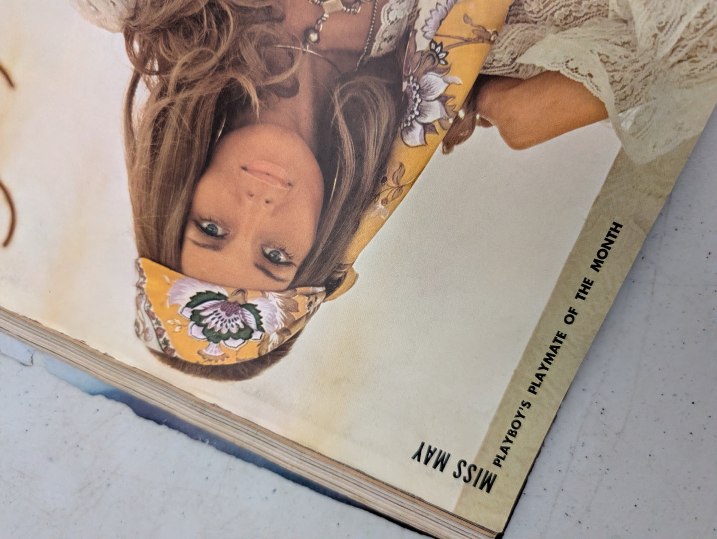 Inside centerfold page view of vintage Playboy magazine