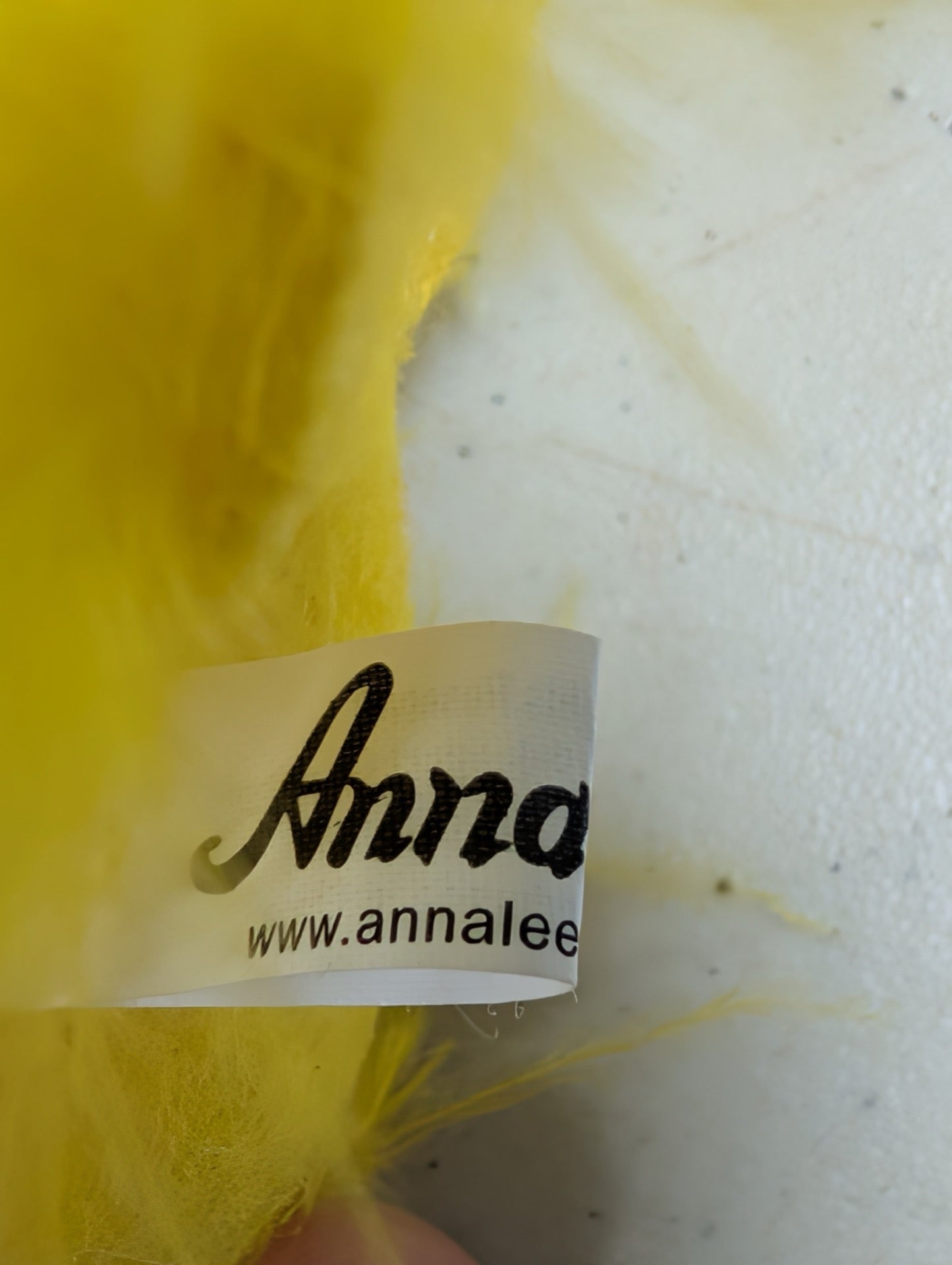 Close-up of Annalee brand tag