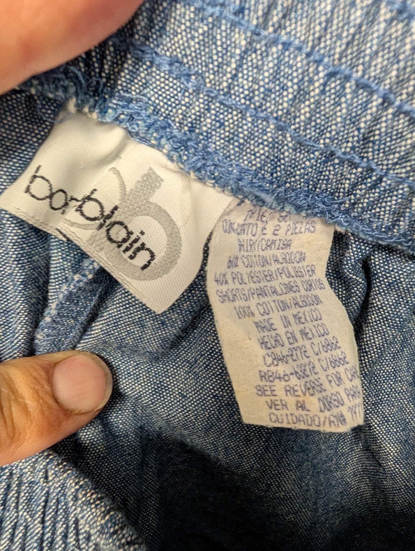Barblain vintage clothing tag showing fabric details