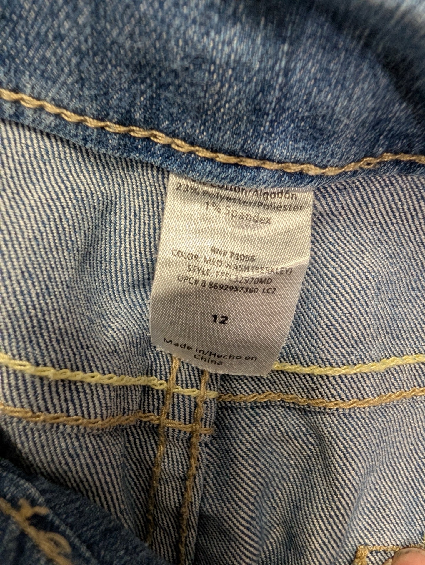 Inner tag showing size 12 and fabric blend