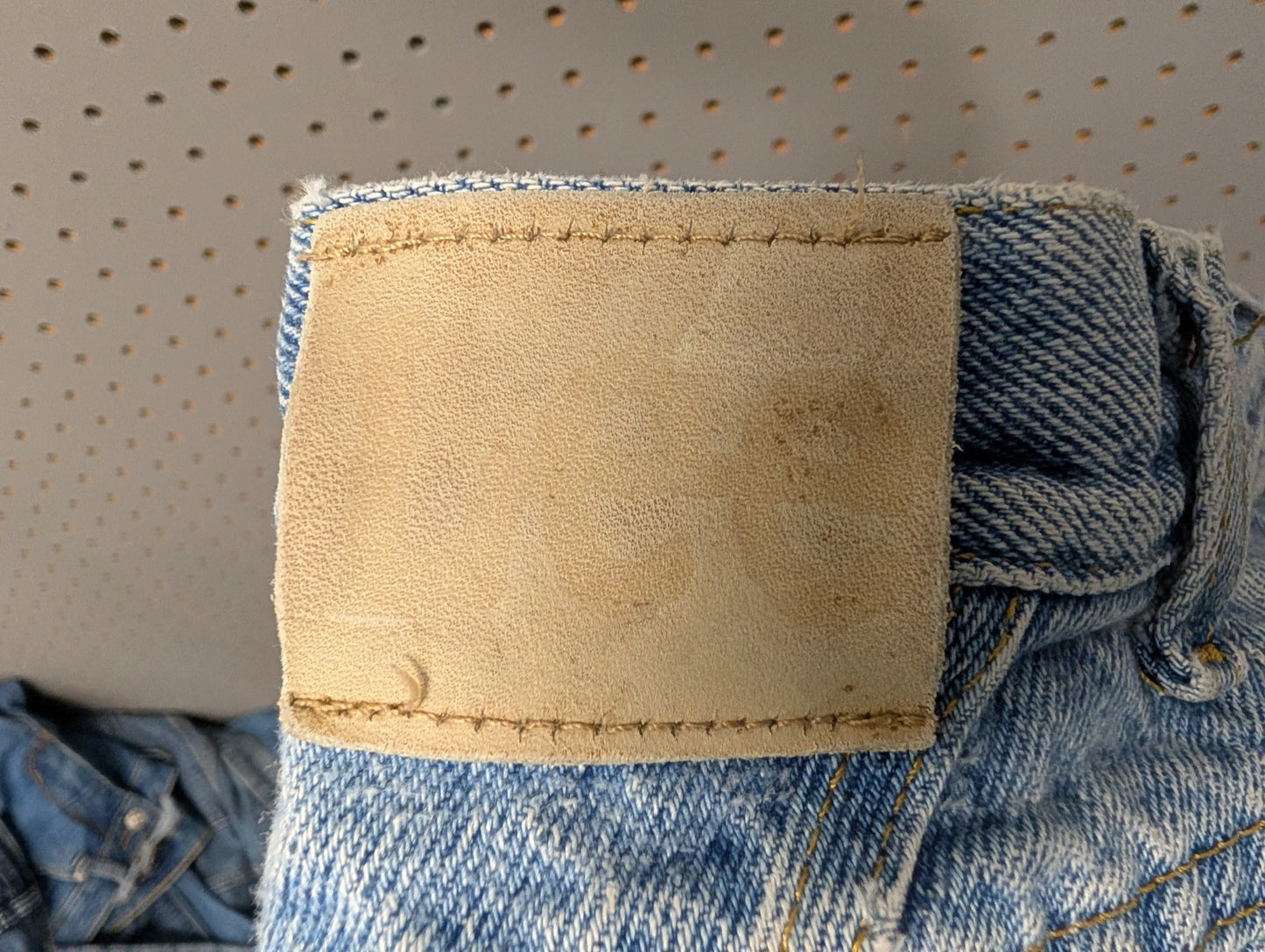Vintage blank leather patch on Lee jeans