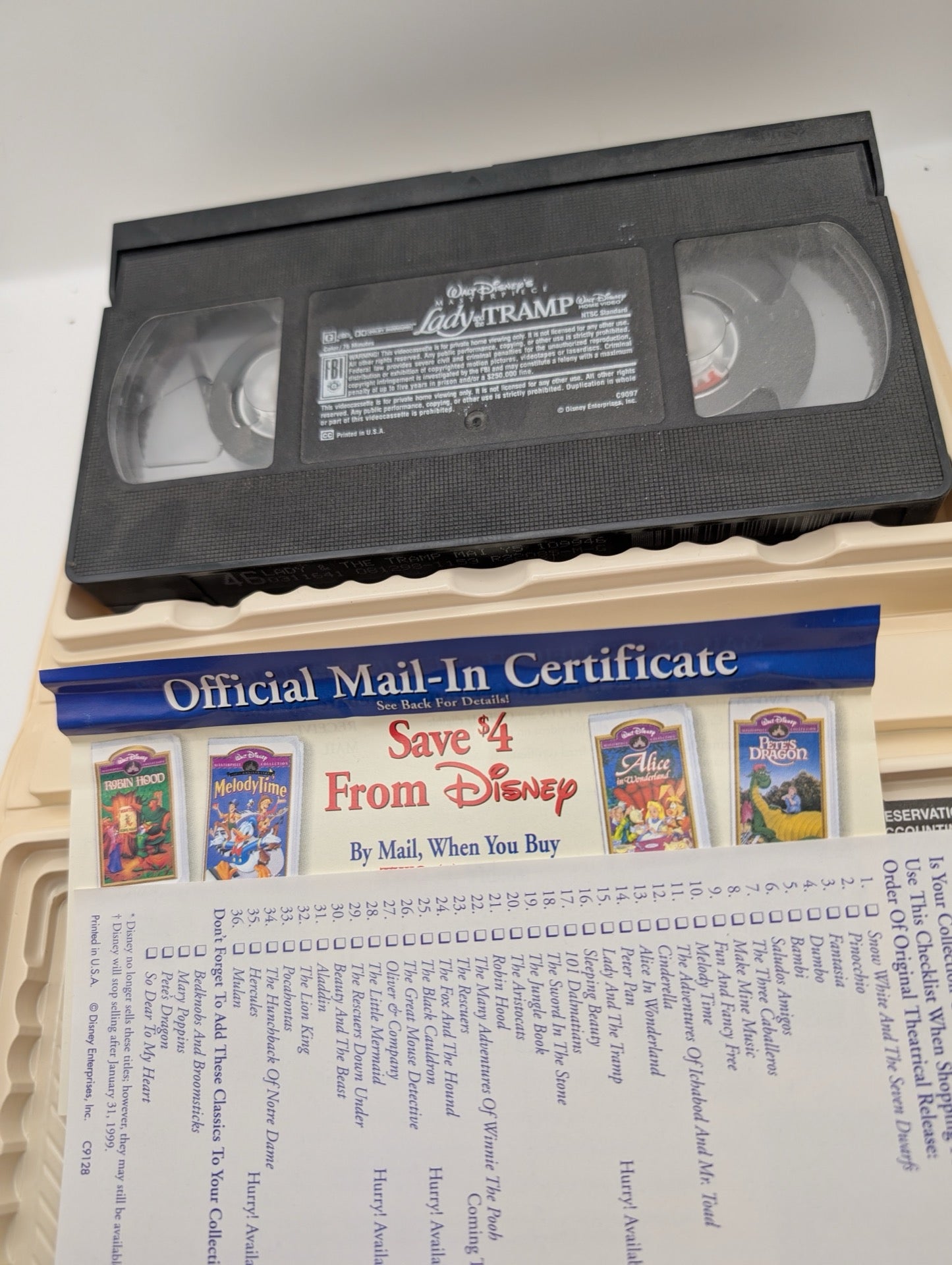Inside of Lady and the Tramp VHS clamshell showing insert