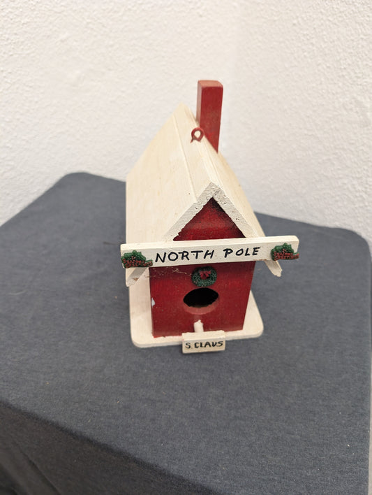 Vintage handcrafted North Pole birdhouse