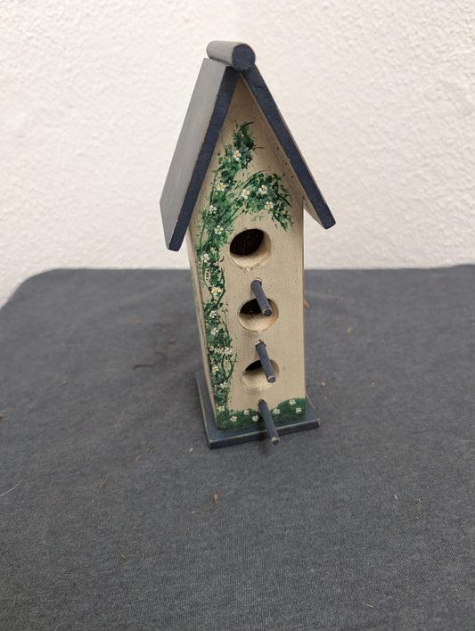 Vintage handcrafted three post tall birdhouse
