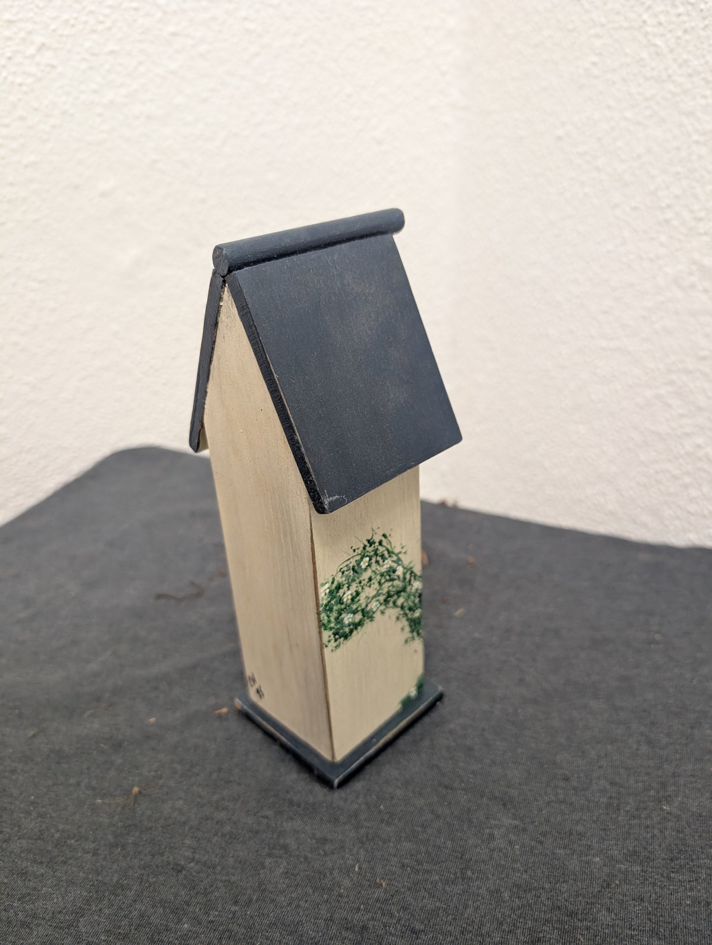 Vintage handcrafted three post tall birdhouse