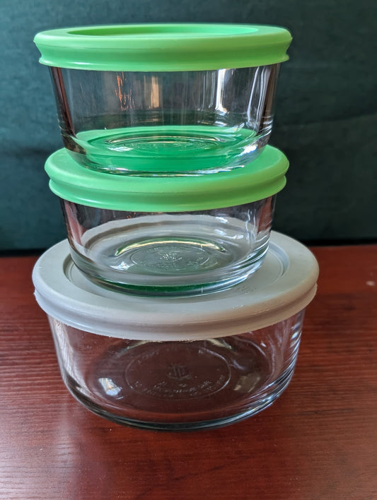 Three Anchor Hocking glass storage bowls
