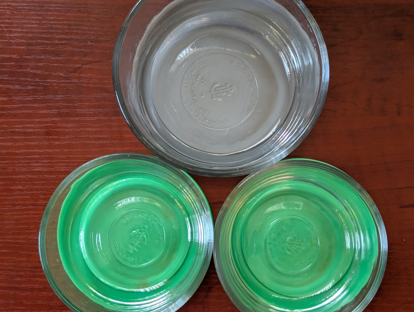 Three Anchor Hocking glass storage bowls