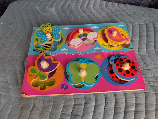 Infant and Toddler Wooden shape puzzle with insects, flowers, and birds