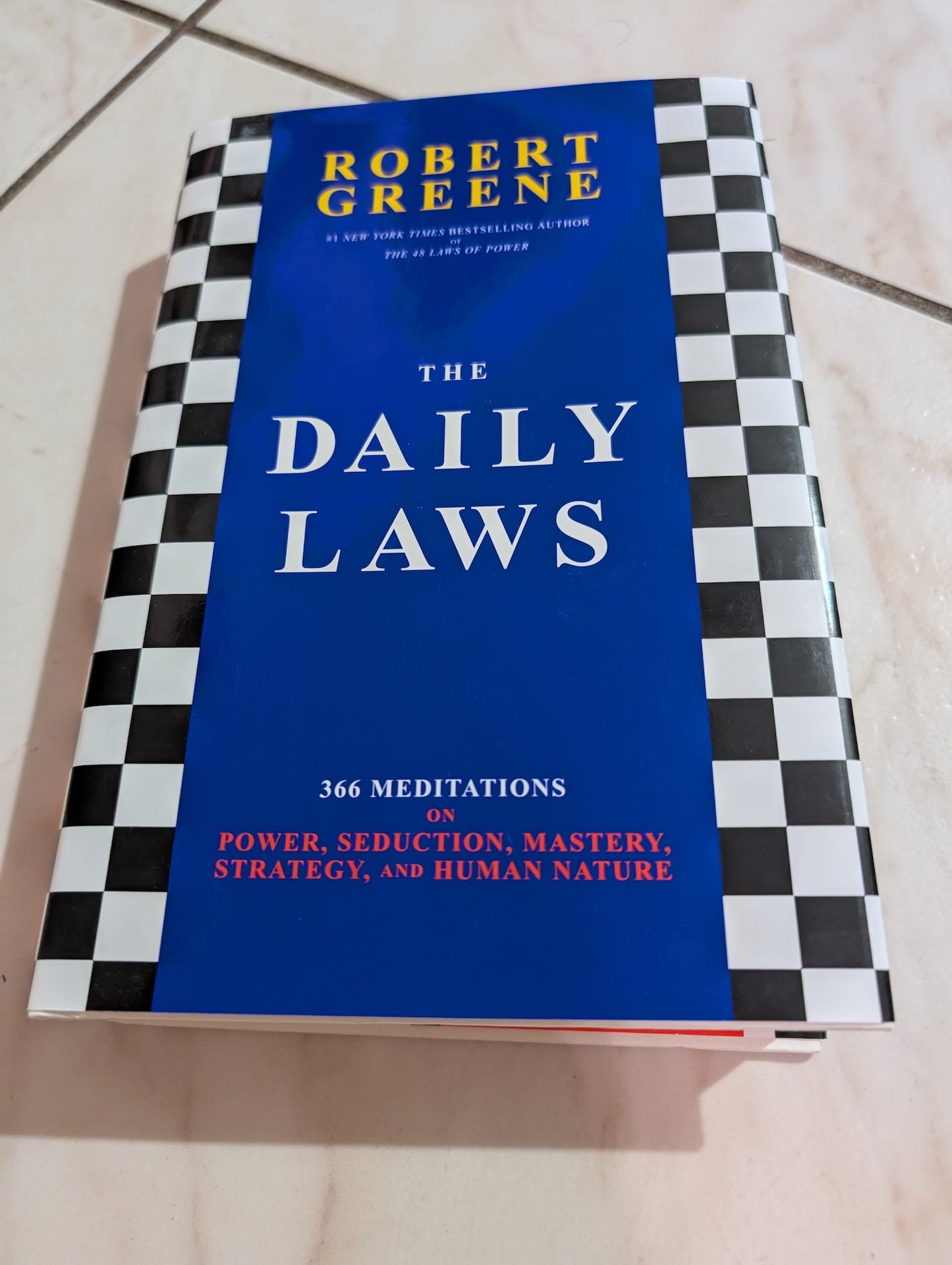 The Daily Laws: 366 Meditations on Power, Seduction, Mastery, Strategy, and Human Nature Book by Robert Greene