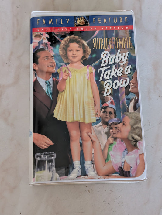 Baby Take a Bow VHS PG 1934 ‧ Family/Musical