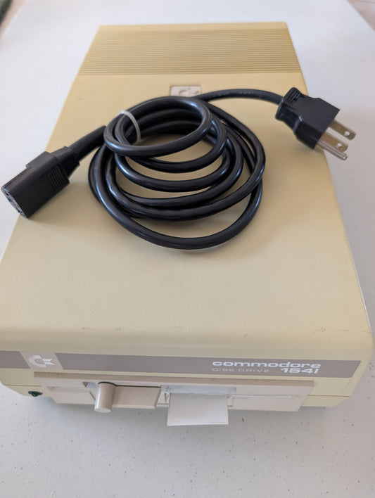 Commodore 1541 Floppy Disk Drive and manual
