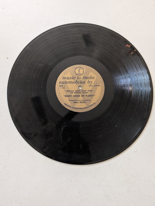 Music to Make Automobiles By... by Hale Rood, released in 1962 as a promotional album for Volkswagen and the short film "The Right Hand Of Plenty(Vintage Vinyl Record LP Album)