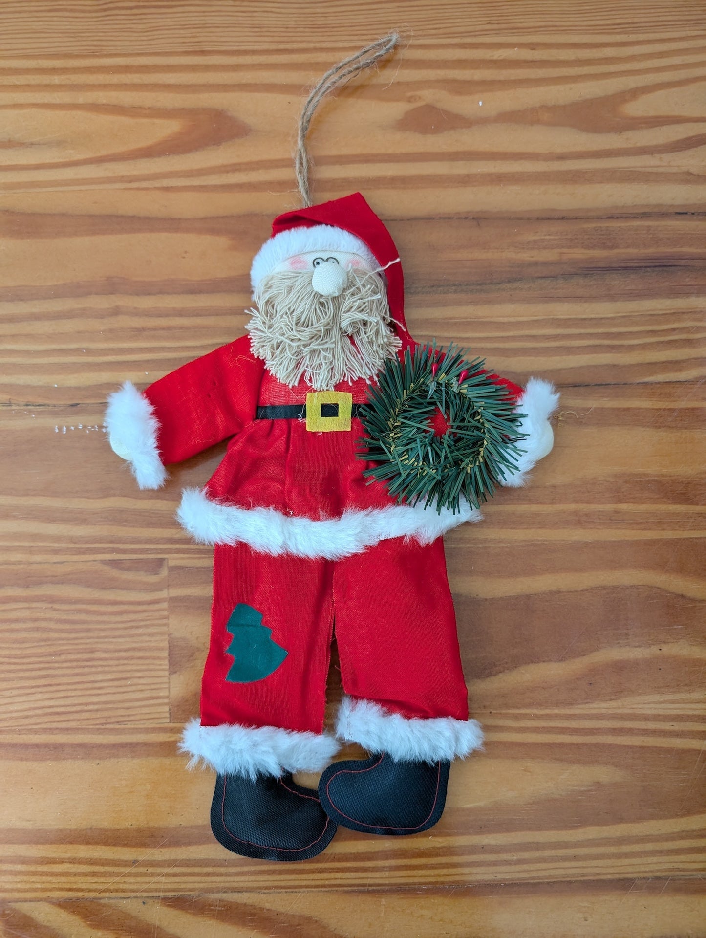 Plush Santa with Wreath from Unknown -  Holiday Decor (Fabric, Faux Fur, Plastic, String Ornament, Handmade, Craft, Traditional, Red, White, Green)