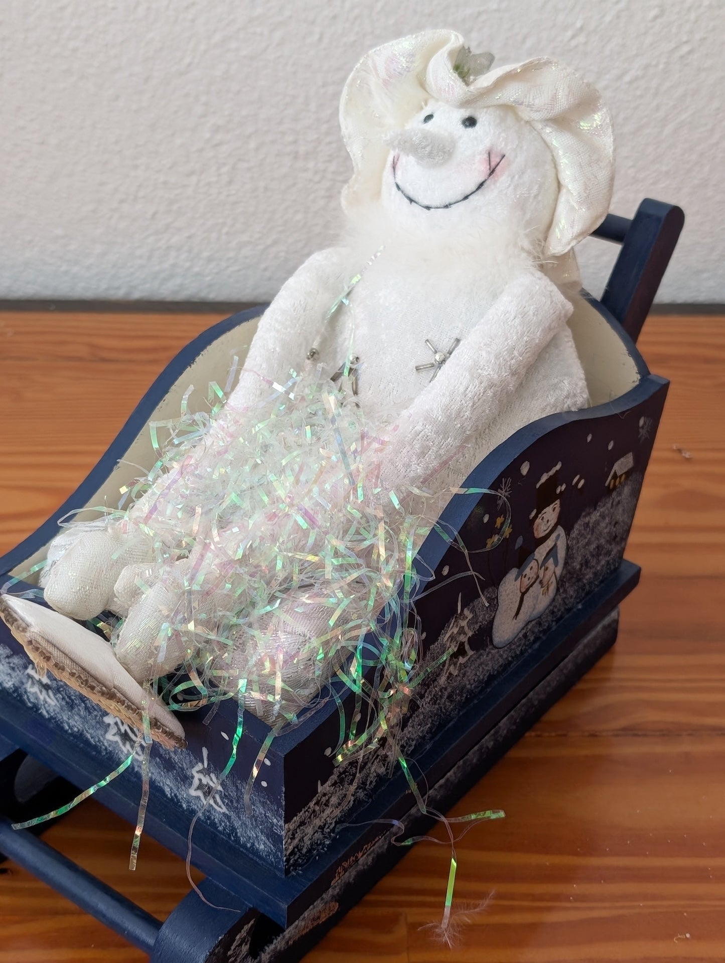 Snowman in Sleigh from Unknown -  Holiday Decor (Fabric, Wood, Tinsel Figurine / Centerpiece, Whimsical, Winter Wonderland, White, Blue, Iridescent)