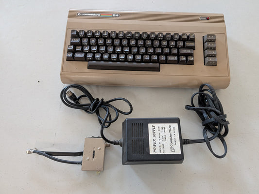 Commodore 64  computer with power supply Serial # P00753948