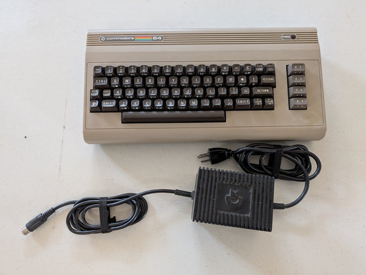 Commodore 64  computer with power supply and RF switch Serial # P00491789