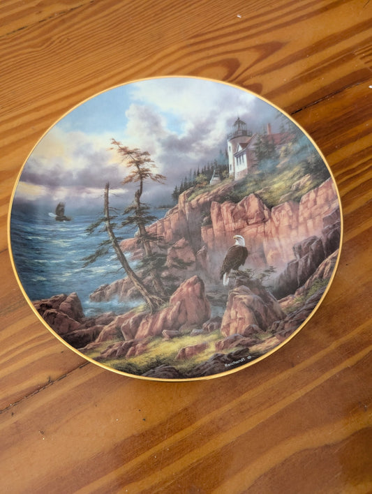 Coastal Guardian (or similar) from The Danbury Mint (likely) - 1990s Wall Decor (Porcelain Collector Plate, Nautical, Wildlife, Coastal, Patriotic, Multicolor (dominant blues, browns, pinks))