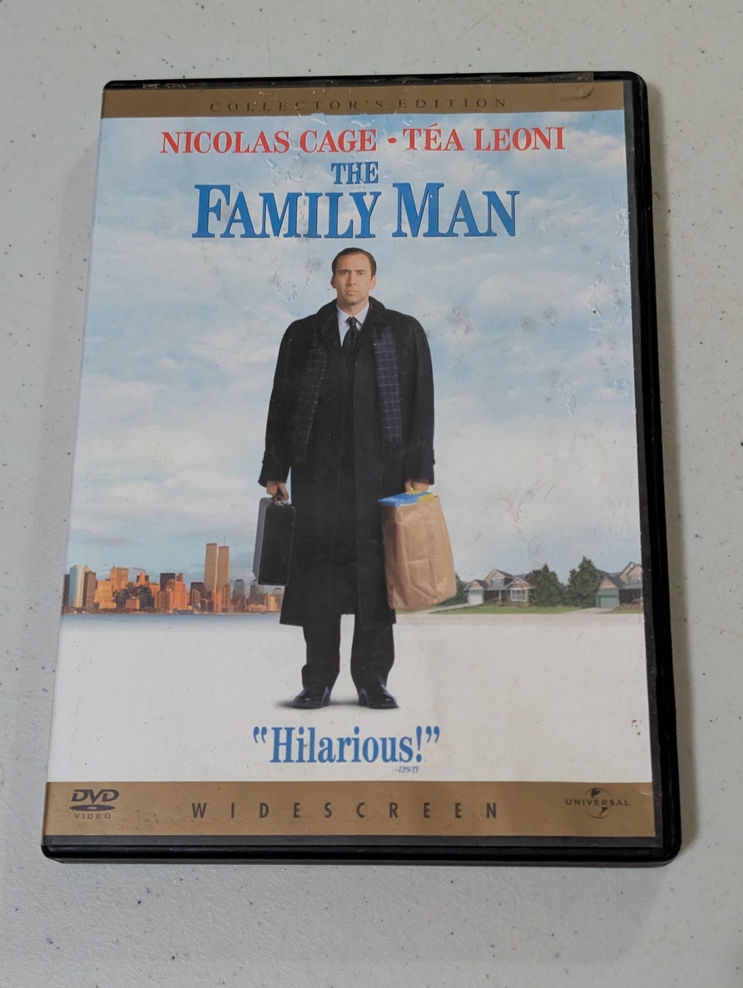 The Family Man 2000 PG-13 romantic comedy movie, DVD Nicolas Cage Tea Leoni(movie, DVD)