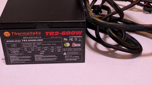 TR2-600NL2NH from Thermaltake - 2010s Computer Components (Metal, Plastic Power Supply Unit, Gamer Aesthetic, Black, Yellow, Red)