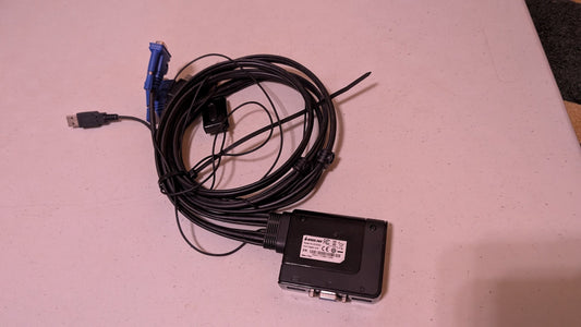 black KVM switch  from Avocent - 2000s Peripherals (Plastic, Metal, Rubber KVM Switch, Utilitarian, Black, Blue)