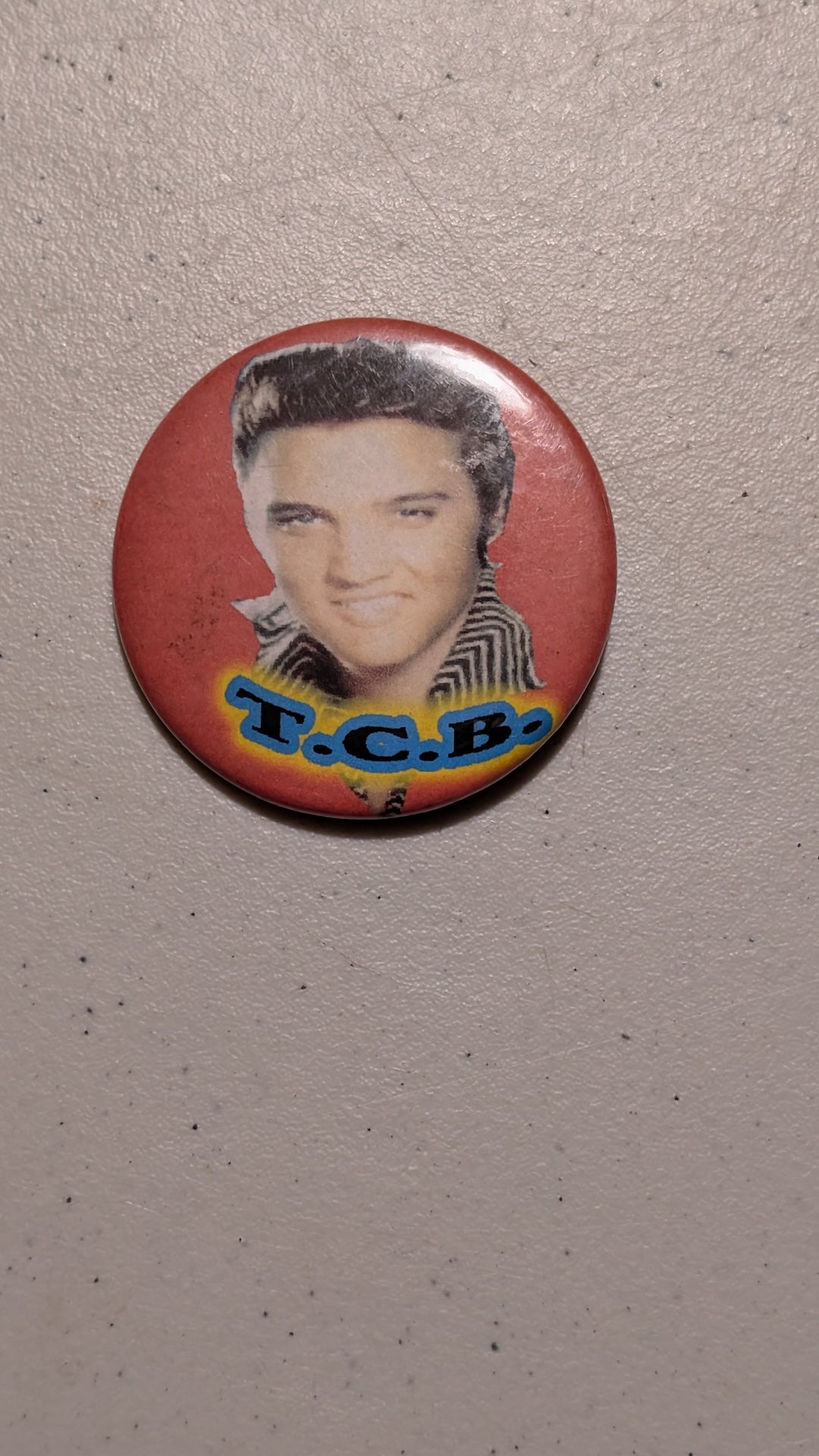 Elvis T.C.B. Pin from Unknown - 1970s Collectibles (Metal, Plastic Pinback Button, Retro, Music Memorabilia, Red, Yellow, Blue, Black, Collectable, Vintage, Original)